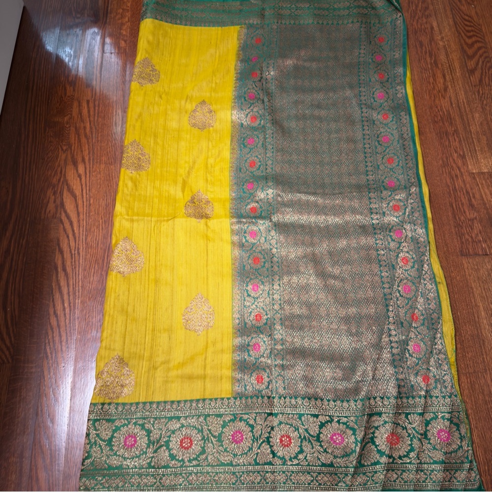 Elegant Yellow and Green Saree with Gold Accents